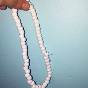 A white beaded necklace